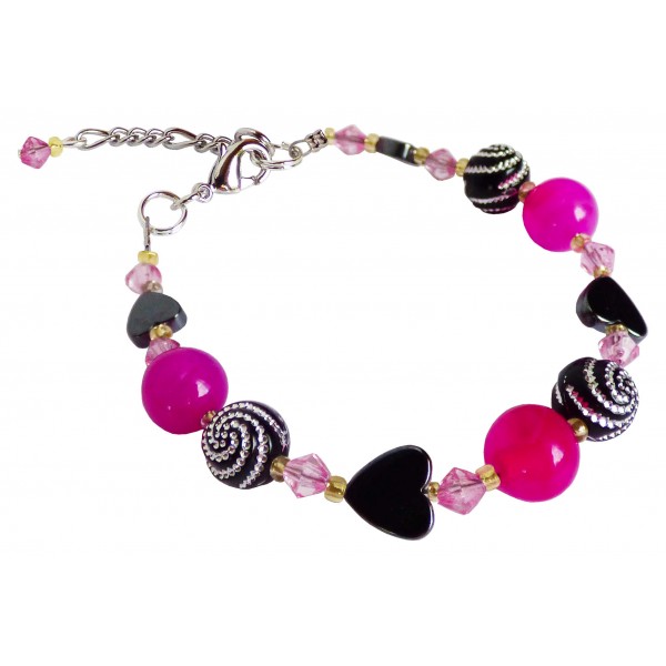 Bracelet demoiselle agates fushia et perles fantaisies à spirales argentées.